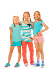 Obraz premium Portrait of three happy girls together hugging