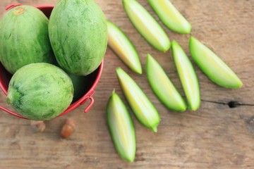 baby melon on wooden vintage
