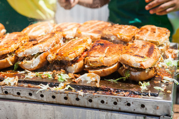  close up of street food sandwich shucos from Ecuador