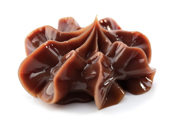 Delicious chocolate cream isolated on white