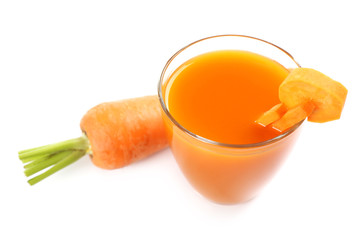 Glass of carrot juice with vegetable slices with vegetables isolated on white