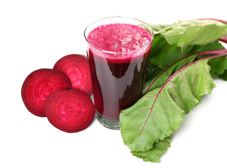 Glass of beet juice with vegetables isolated on white