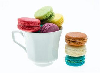 Colorful macarons on white background. Macaron is sweet meringue
