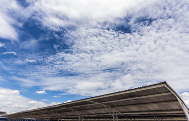 Fototapeta na wymiar Roof tile landscape view against blue sky