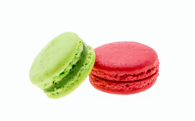 Colorful macarons on white background. Macaron or Macaroon is sw