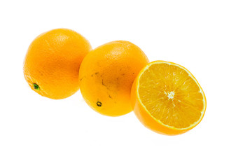 Orange fruit with slice on white background