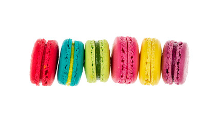 Colorful macarons on white background. Macaron or Macaroon is sw