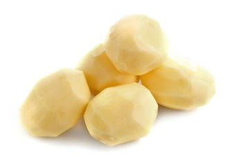 Raw peeled potatoes isolated on white