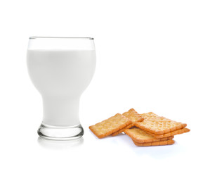 Fresh milk with cracker on white background
