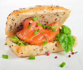 Sandwich with salmon for healthy breakfast.