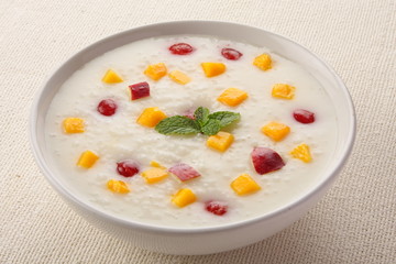 Organic rice, plum and mango pudding