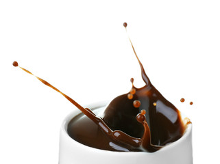 Splash of hot chocolate in cup isolated on white