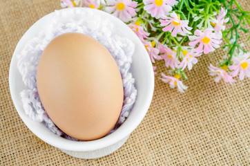 Egg in white bowl