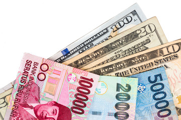 Fototapeta na wymiar Close up of Indonesia Rupiah currency note against US Dollar