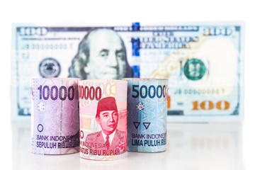 Close up of Indonesia Rupiah currency note against US Dollar