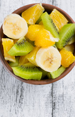 Fruit salad with kiwi, banana and orange
