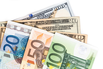 Close up on Euro against US Dollar currency notes