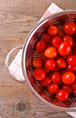 Tomatoes in colander. 
