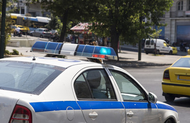 police car, blue lights in Athens
