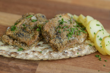 Pickled fried herring on cispbread