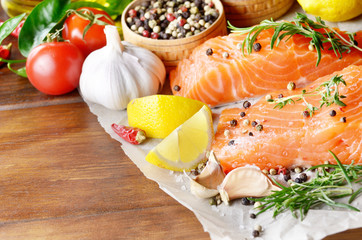 Raw salmon on baking paper