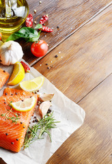 Raw salmon on baking paper