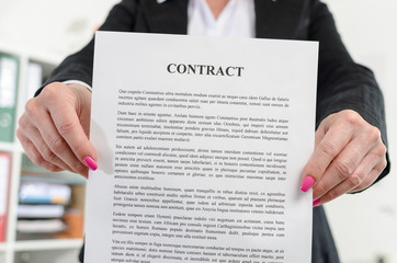 Businesswoman holding a contract