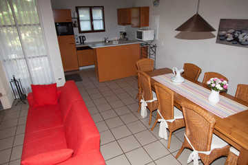 Modern, red sofa, clean, living room   in a  house
