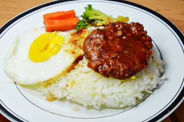 pork steak and fried egg with Japanese rice
