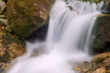 Mountain stream in the spring in the Giant Mountains, Poland .