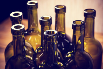 Closeup of empty bottles of wine