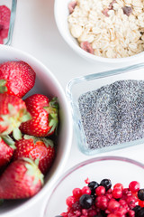 close up of fruits and berries in bowl on table