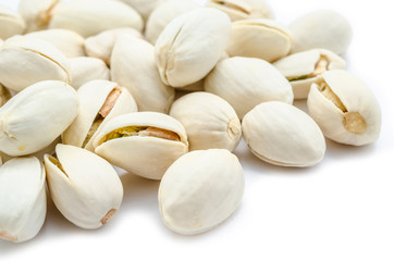 Heap of pistachios nuts.