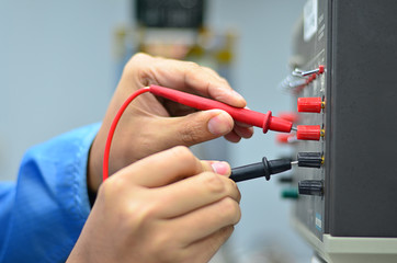 Engineer Checking Voltage