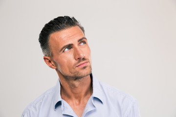 Fototapeta premium Confident man looking away at copyspace