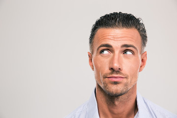 Fototapeta premium Handsome man looking away at copyspace