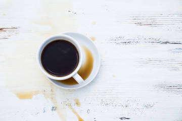 Spilled coffee on the white table