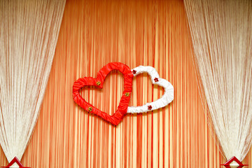 Wedding ornament with hearts and curtain