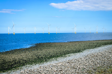 Offshore Wind Turbine in a Windfarm under construction off the England