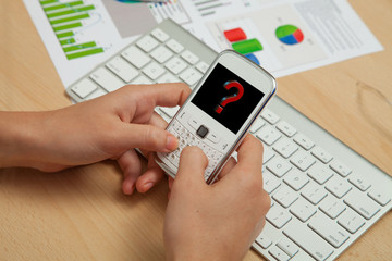 Business, Finanace Diagrams and mobile phone with question mark
