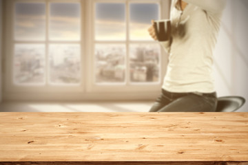 wooden desk space and woman with window sill 