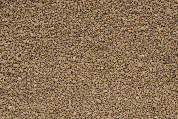 Cocoa granules background texture.