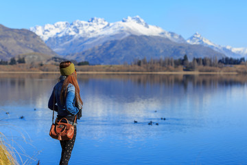 Young adult woman enjoy lake view