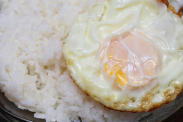rice and fried eggs of easy breakfast cooking