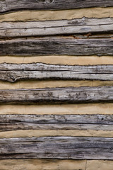 Wood and mortar details on log cabin