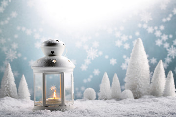 Christmas lantern with snowfall © powerstock