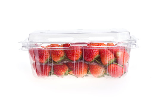 Red Ripe Strawberry In Plastic Box Of Packaging, Isolated