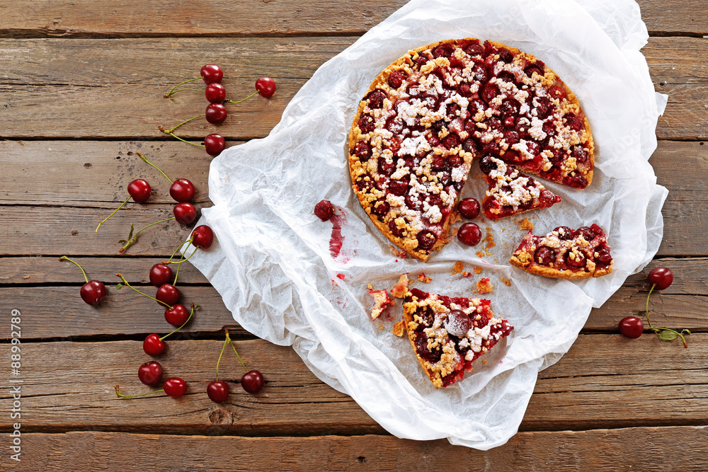 Wall mural tasty homemade pie with cherries on table close up