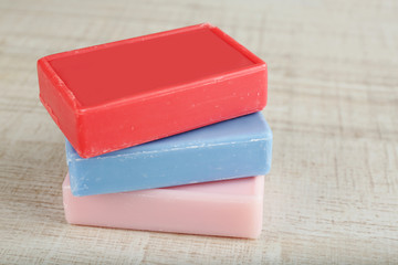 Bars of natural soap on light background