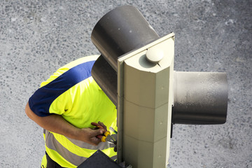 utility electrician worker to repair traffic lights